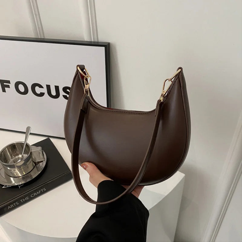 Carrow mini moon crescent shoulder bag