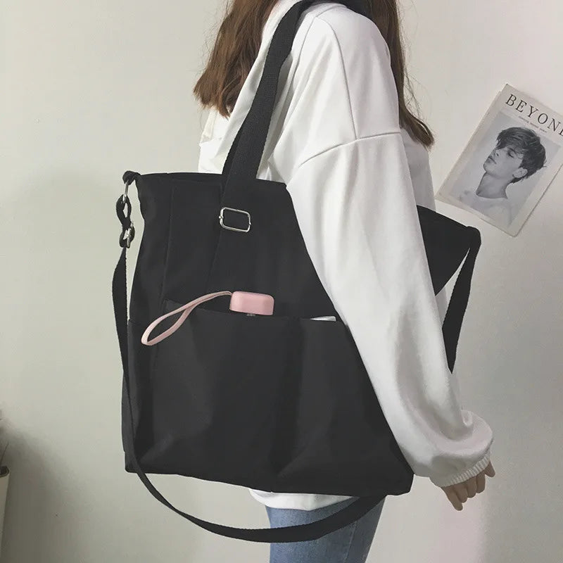 Carrow water-resistant Oxford crossbody tote bag