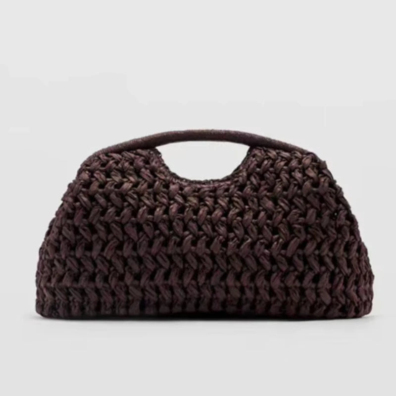 Carrow woven straw clutch bag